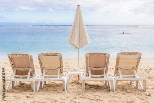 chairs and umbrella on the beach  R  union Island 