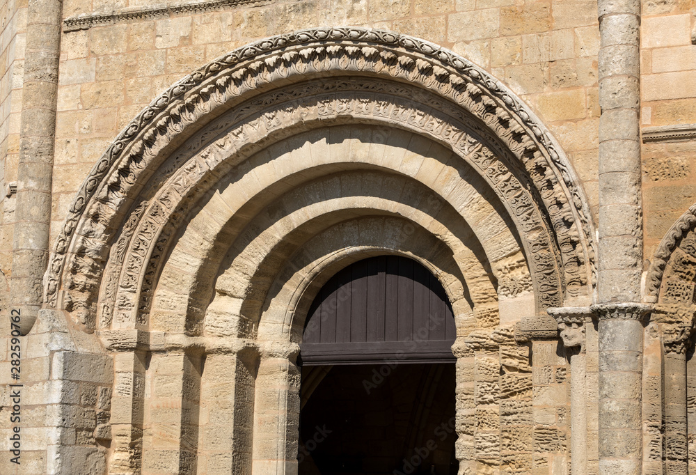 Entrance and portal at the Collegiale church of Saint Emilion, France