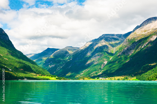 Oldevatnet lake with green water in the mountains in Norway. Beautiful summer landscape © smallredgirl