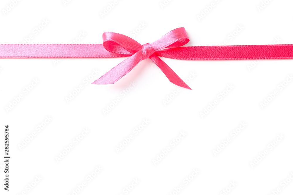 Pink ribbon with bow isolated on white background. Gift concept