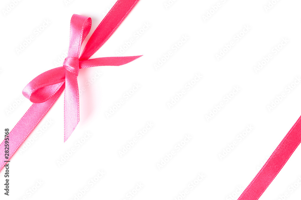 Pink ribbons with bow isolated on white background. Gift concept Pink ribbons with bow isolated on white background. Gift concept