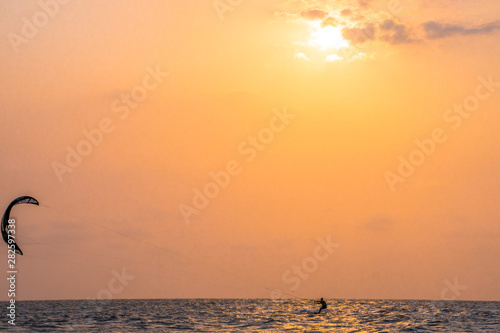 kitesurfing with a spectacular sunset in Cartagena, Colombia
