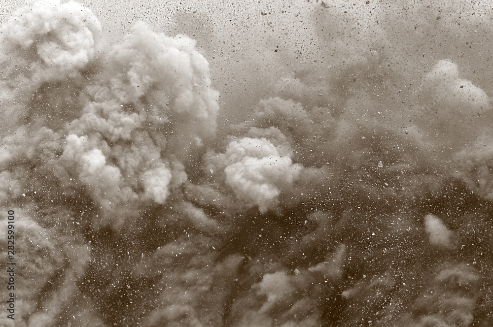 Rock particle and dust clouds after detonator blast - obrazy, fototapety, plakaty 
