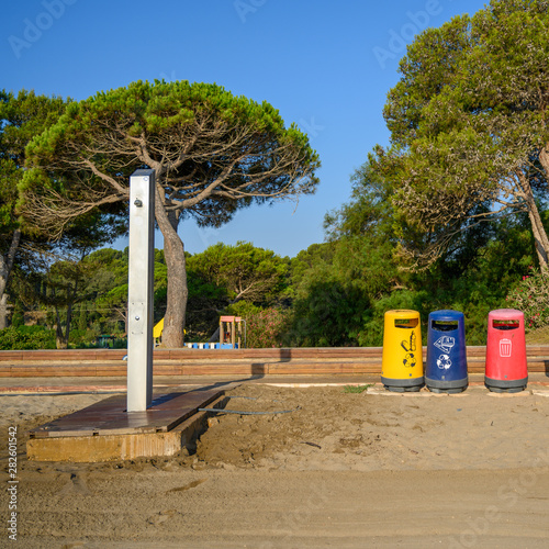 Recycling waste station and beach shower at L'escala Catalonia costa Brava Spain photo