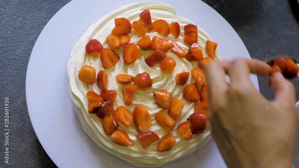 The process of making dessert Anna Pavlova with berries and cream The process of making dessert Anna Pavlova with berries and cream