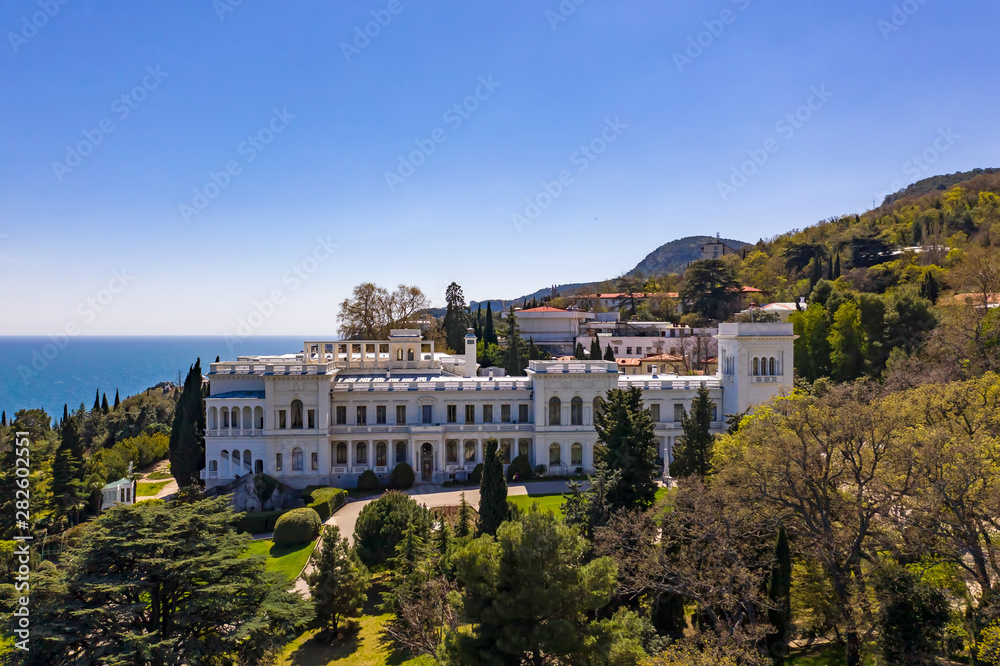 Aerial drone shot of Livadia Palace with a beautiful landscaped garden in Crimea