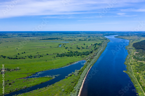 Big river and flood meadows. Aerial drone view © Victor Lauer