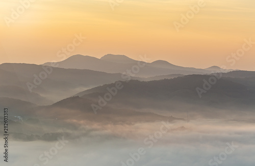 A landscape view of beautiful sunrise and sea of clouds at Anbandeogi of Gangneung,  South Korea. © 은실 안