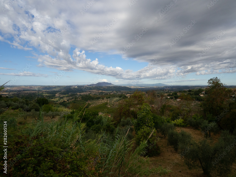 Italian landscape with dramatic sky, clouds, olive trees. Montopoli di Sabrina