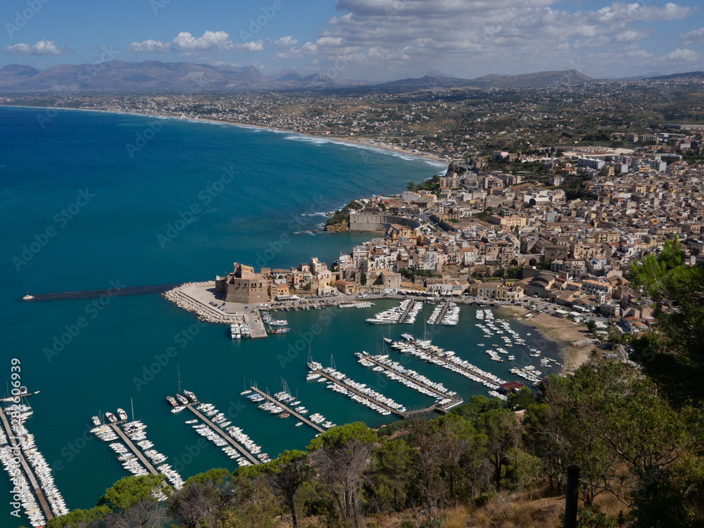 Harbour with fortress with many boats and yachts. Castellammare del Golfo, Sicily, Italy
