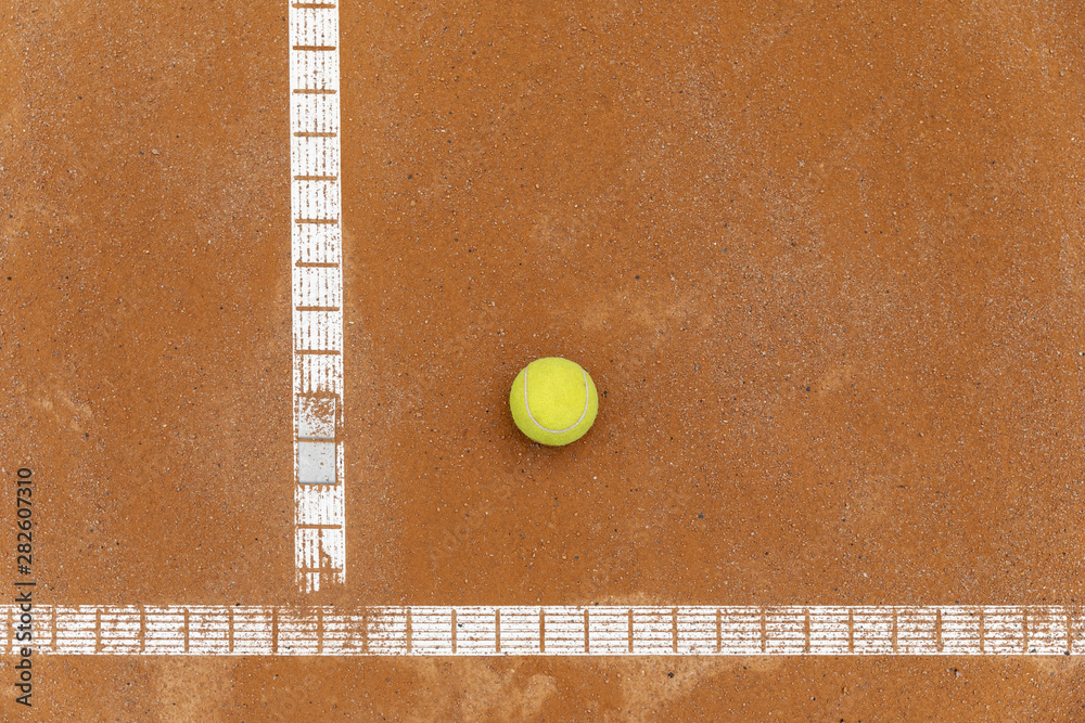 Top view tennis ball on court ground