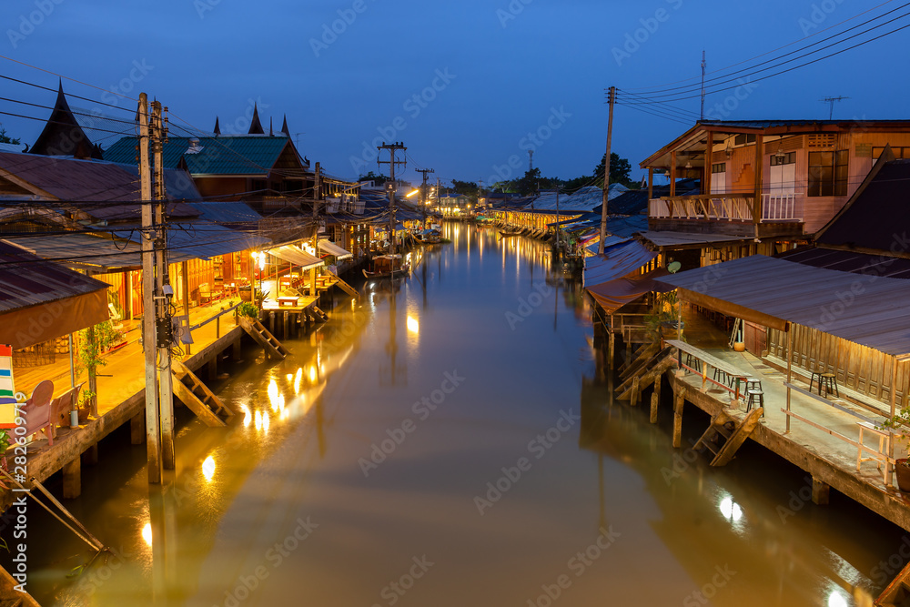 Sunrise at Amphawa floating Market and thai cultural for tourist destination.