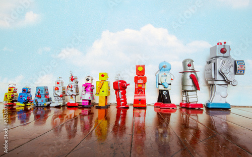 a line of vintage robots from small to big