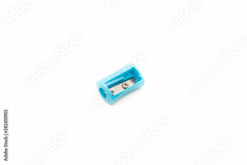 Blue plastic sharpener for a pencil on a white background.