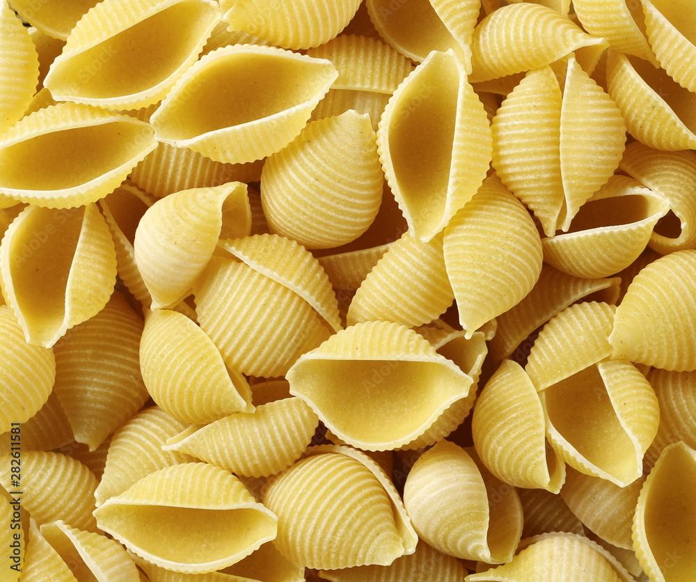 Conchiglie grandi pasta background and texture, top view Stock Photo