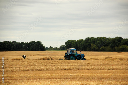 crane running after a tractor