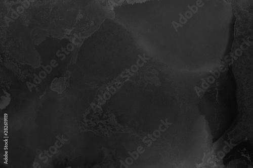 Hand painted black alcohol ink background. Abstract delicate gray texture. Contemporary wallpaper. Fog effect.