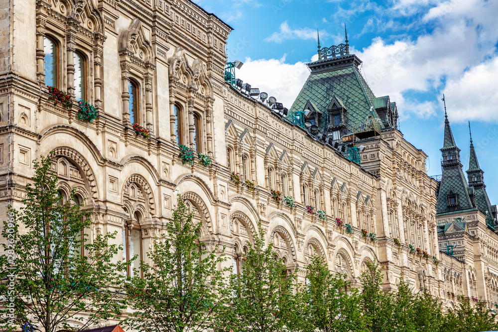 Fototapeta premium The beautiful wall of the main department store of Moscow, a historical building. Against the background of blue sky.