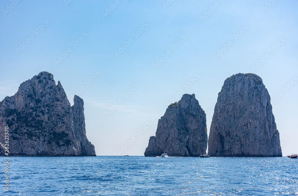 Italy, Capri, view of the faraglioni seen from the sea. Italy, Capri, view of the faraglioni seen from the sea.