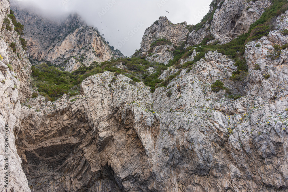 Italy, Capri, view of the coast seen from the sea.