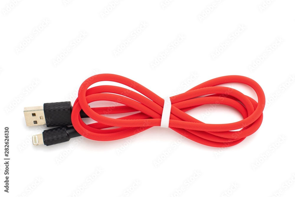 Red USB cable for smartphone isolated on white background. Top view Red USB cable for smartphone isolated on white background. Top view