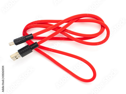 Red USB cable for smartphone isolated on white background. Top view