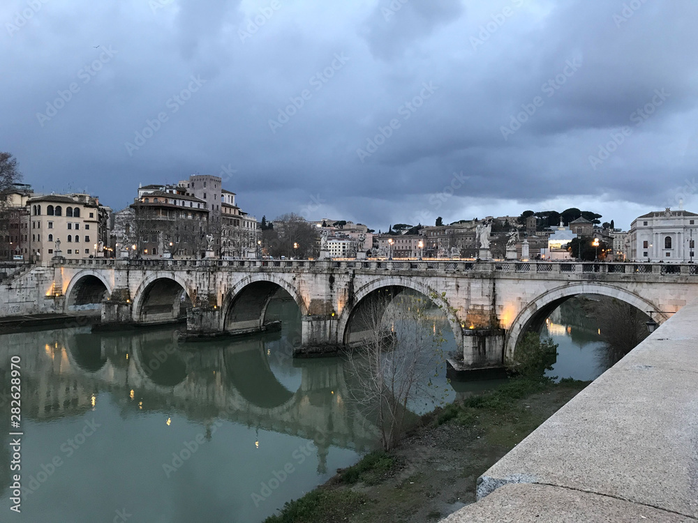 Obraz premium Rome, Italy. St. Angel's Bridge in the evening with beautiful lighting