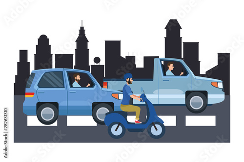 Vehicles and motorcycle with drivers riding