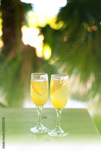 Refreshing orange Mimosa cocktails with champaigne