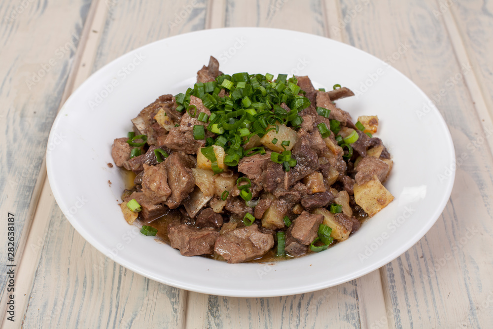Kazakh national dish of meat and liver - kuyrdak