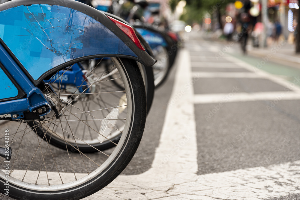 Bicycle rental in the city with blurred background Bicycle rental in the city with blurred background