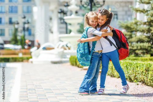 Happy children girls girlfriend schoolgirl student elementary school