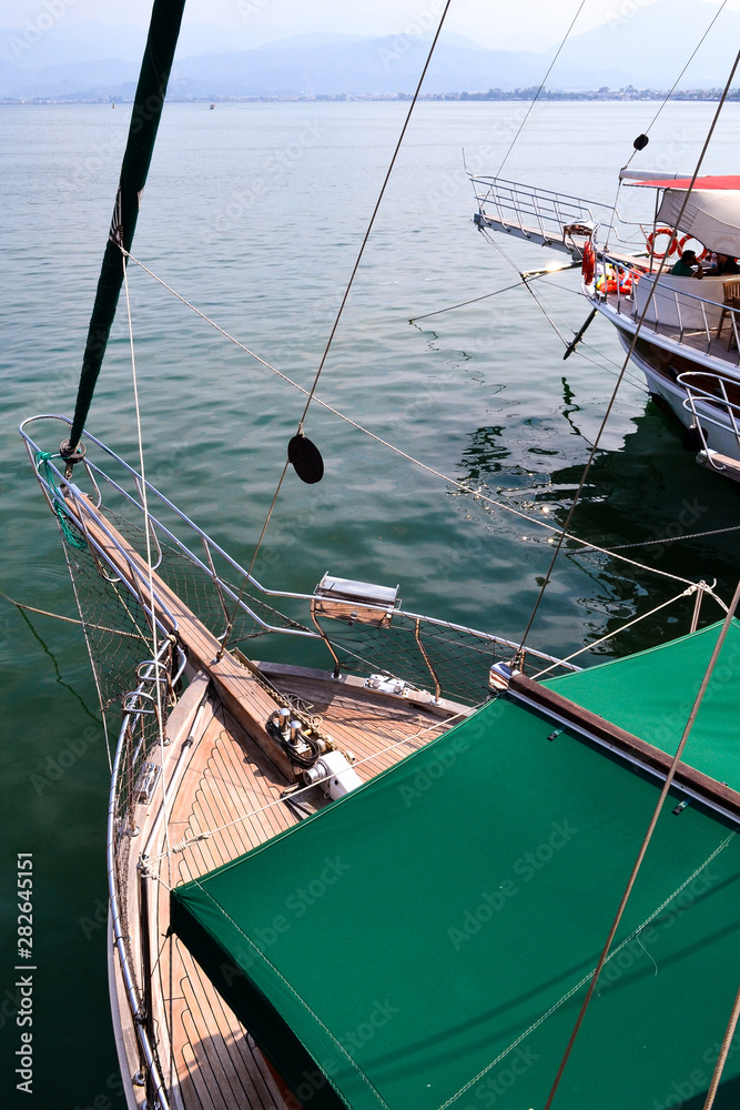 The bow of a pleasure ship that stands on a port roadstead