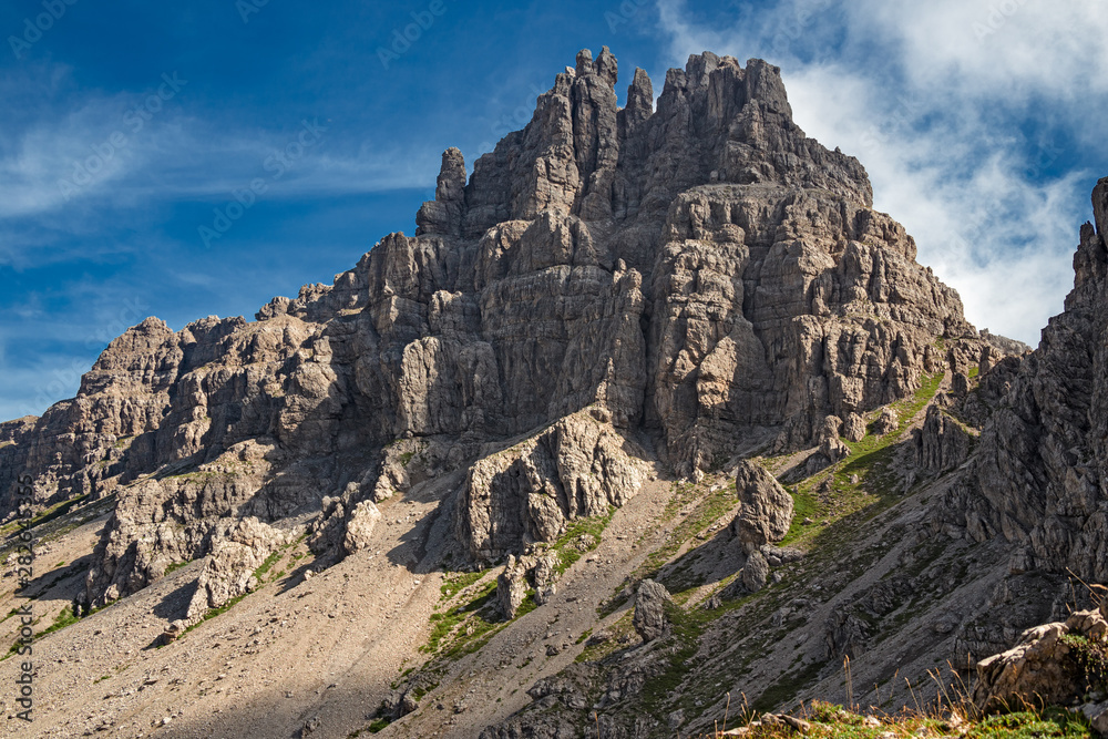Panoramic view of towers and peaks of the Friuli Dolomites, in the morning light, in Friuli, Italy. Panoramic view of towers and peaks of the Friuli Dolomites, in the morning light, in Friuli, Italy.