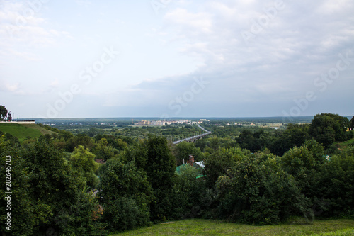 Panorama of the valley with a car bridge over the river Klyazma summer day in Vladimir Russia © Inna