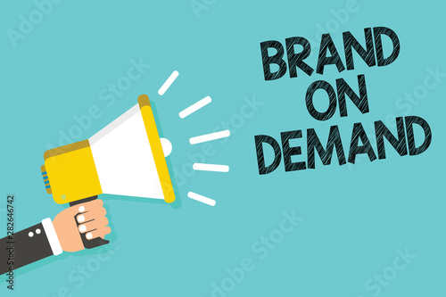 Writing note showing Brand On Demand. Business photo showcasing Intelligence needed Smart thinking Support Assistance Man holding megaphone loudspeaker blue background message speaking © Artur