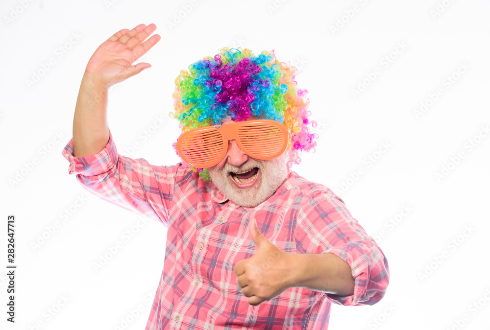 Fun time. happy man with beard. Celebration retirement. Crazy man in playful mood. happy birthday. corporate party. anniversary holiday. mature bearded man in colorful wig and party glasses