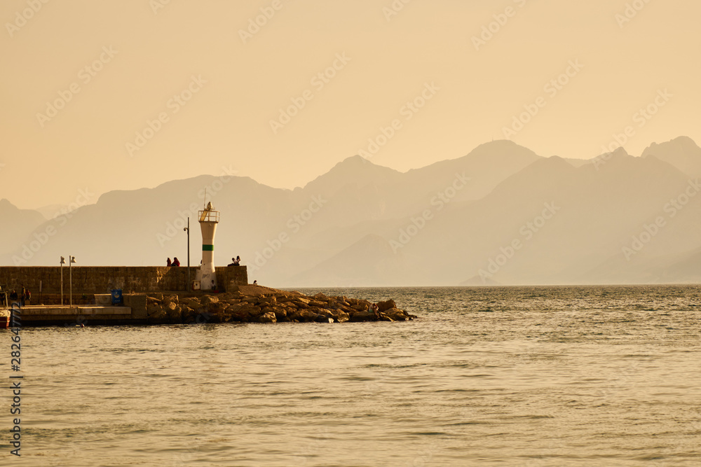 a lighthouse and seascape background