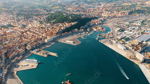 Aerial view of Beautiful port. Logistics and transportation, import export and transport industry.
