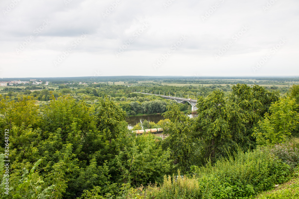 Panorama of the valley with a car bridge over the river Klyazma summer day in Vladimir Russia Panorama of the valley with a car bridge over the river Klyazma summer day in Vladimir Russia