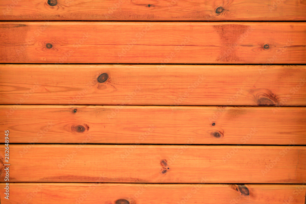 Obraz premium Element of a wooden tinted veranda of a country house