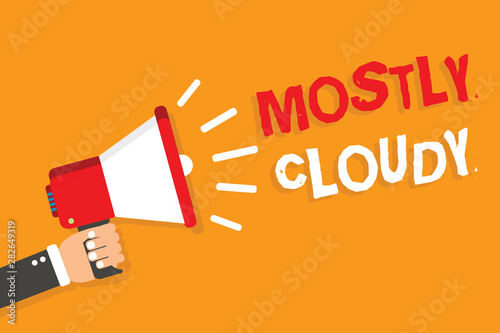 Conceptual hand writing showing Mostly Cloudy. Business photo showcasing Shadowy Vaporous Foggy Fluffy Nebulous Clouds Skyscape Man holding megaphone orange background message speaking © Artur