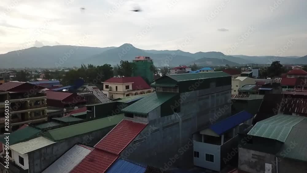Drone flying in front of an edible bird's nest building in Kampot town, Cambodia. Bird's nests are an important industry in South East Asia countries, and an expensive delicacy of chinese cuisine Drone flying in front of an edible bird's nest building in Kampot town, Cambodia. Bird's nests are an important industry in South East Asia countries, and an expensive delicacy of chinese cuisine