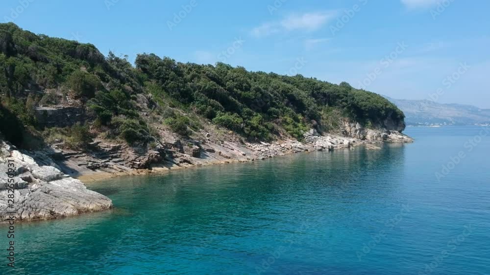 Beautiful seascape. Beach on coast of Ionian Sea in Albania, Ksamil, near Greece island Corfu Beautiful seascape. Beach on coast of Ionian Sea in Albania, Ksamil, near Greece island Corfu