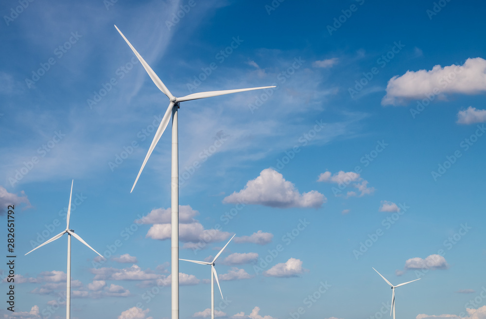 wind turbines on blue sky