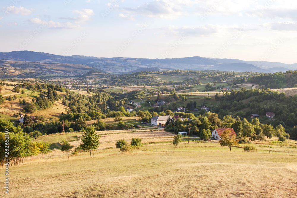 Nature and environment. Fields and hills. Mountain landscape in the summer. Travel, tourism and agriculture. Slovakia