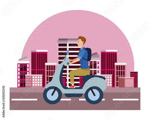 Young man riding scooter motorcycle