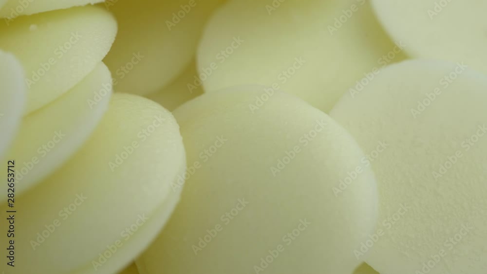 macro rotation video shooting,white chocolate is compressed into tablets. For easy storage and cooking macro rotation video shooting,white chocolate is compressed into tablets. For easy storage and cooking