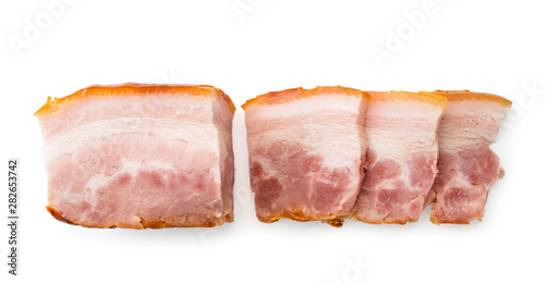 Bacon sliced on a white background. The view of top.