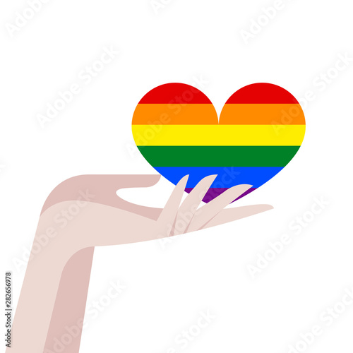 Rainbow heart in hand. Love. Feelings and emotions. Signs and symbols of love. Flat vector illustration